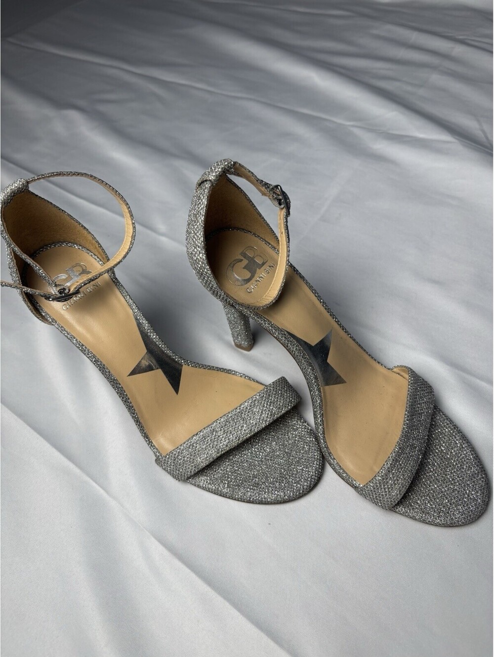 G by Guess Women's Silver Glitter Ankle Strap High Heel Sand